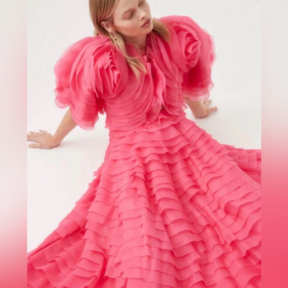 And pink ruffle dress